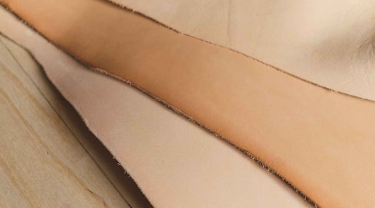 Close-up of natural vegetable-tanned leather texture with warm light by HappyPatina