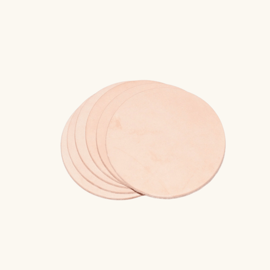 Handcrafted natural vegetable-tanned leather round coaster set by Happy Patina