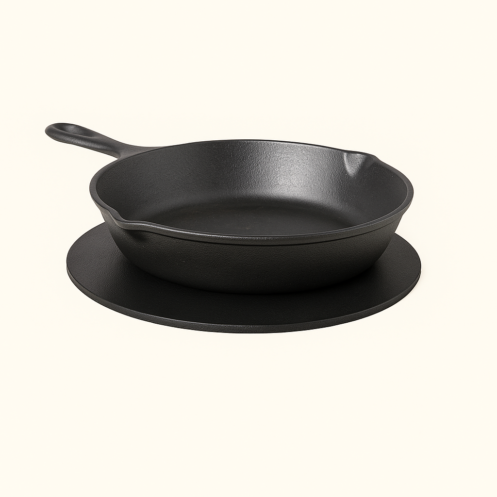 Round black leather trivet in natural veg‑tan by Happy Patina