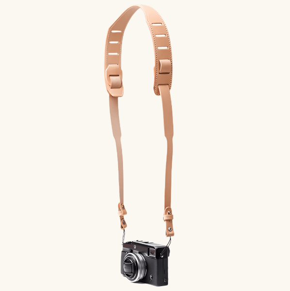 Handcrafted natural vegetable-tanned leather SLR camera strap with brass hardware by Happy Patina