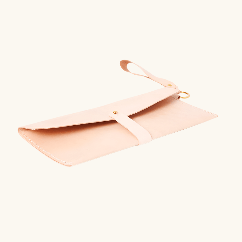 Taylor clutch crafted in natural vegetable-tanned leather by Happy Patina