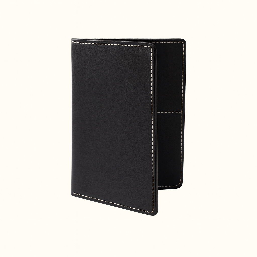 Travel wallet handcrafted in natural veg‑tan black leather by Happy Patina