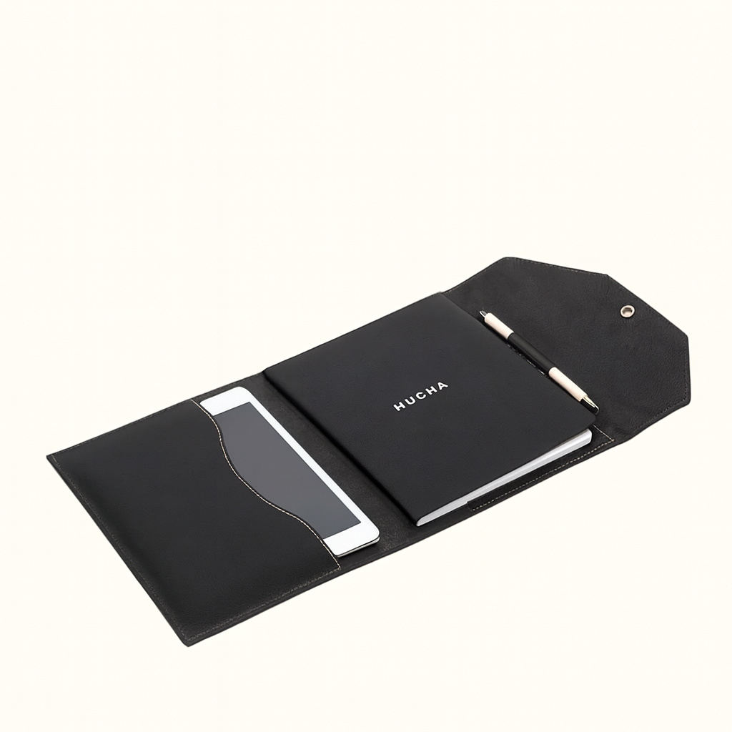 Writing kit cover in natural veg‑tan black leather by Happy Patina