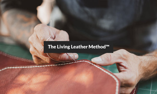 Artisan working with vegetable-tanned leather in HappyPatina workshop showing The Living Leather Method