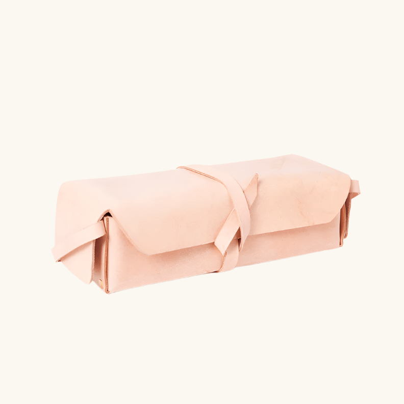 Dopp Kit toiletry bag crafted in natural veg-tan leather by Happy Patina