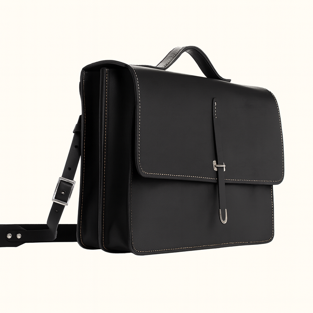 Messenger leather satchel handcrafted in natural veg-tan black leather by Happy Patina