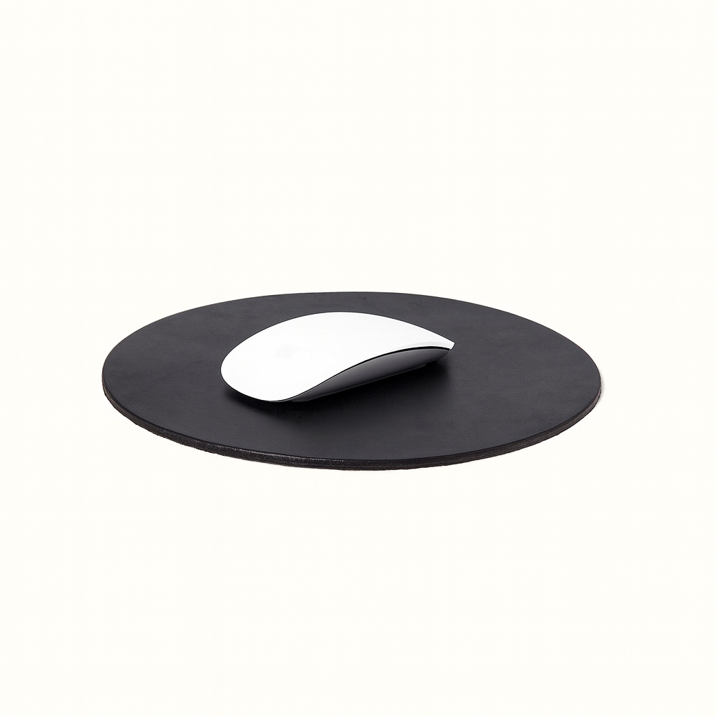 Round mousepad made of natural vegetable‑tanned black leather by Happy Patina