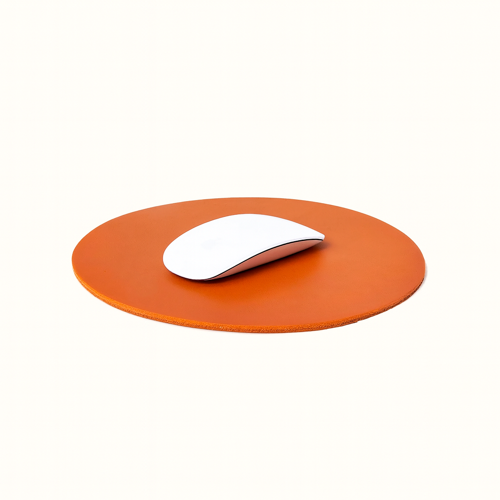 Round mousepad made of natural vegetable‑tanned tan brown leather by Happy Patina