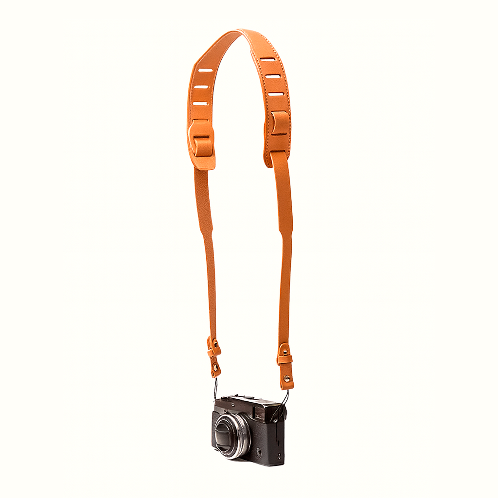 Handcrafted natural vegetable-tanned tan leather SLR camera strap with brass hardware by Happy Patina