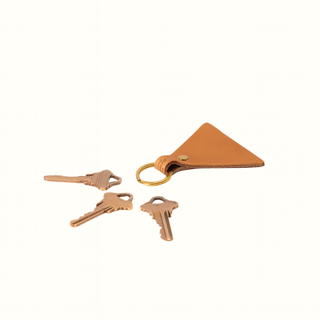 Handcrafted triangular natural veg-tan tanned leather key fob by Happy Patina