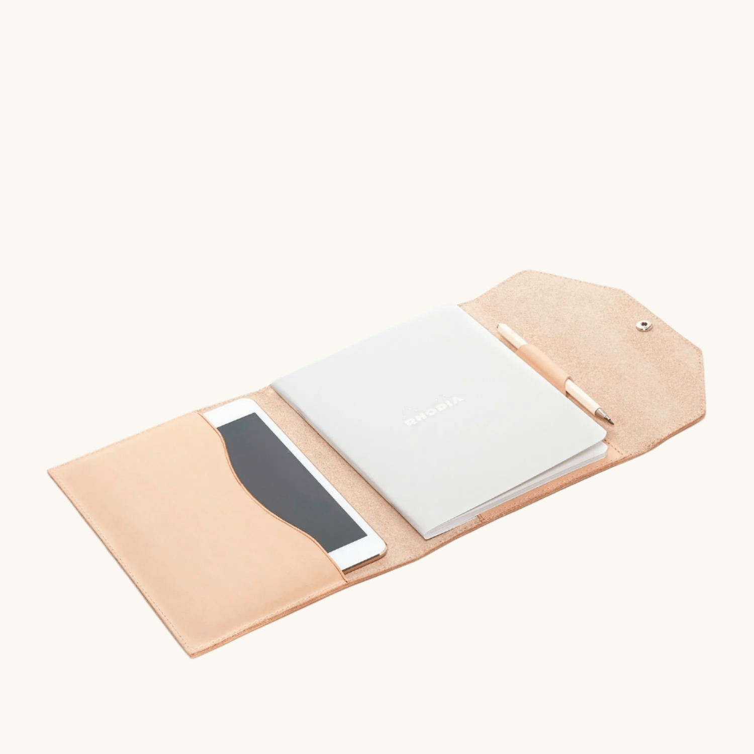 Writing kit cover in natural veg‑tan leather by Happy Patina