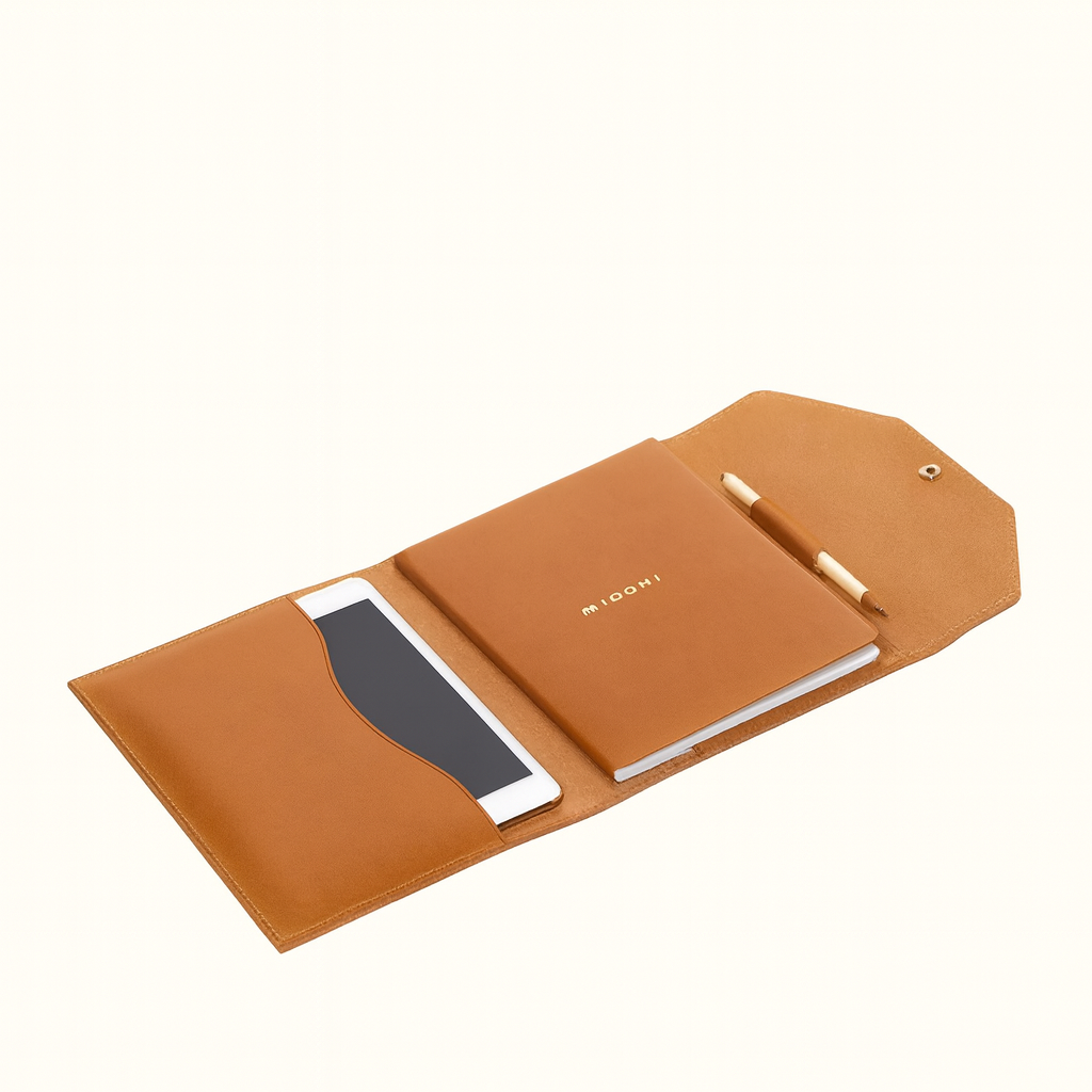 Writing kit cover in natural veg‑tan brown tanned leather by Happy Patina